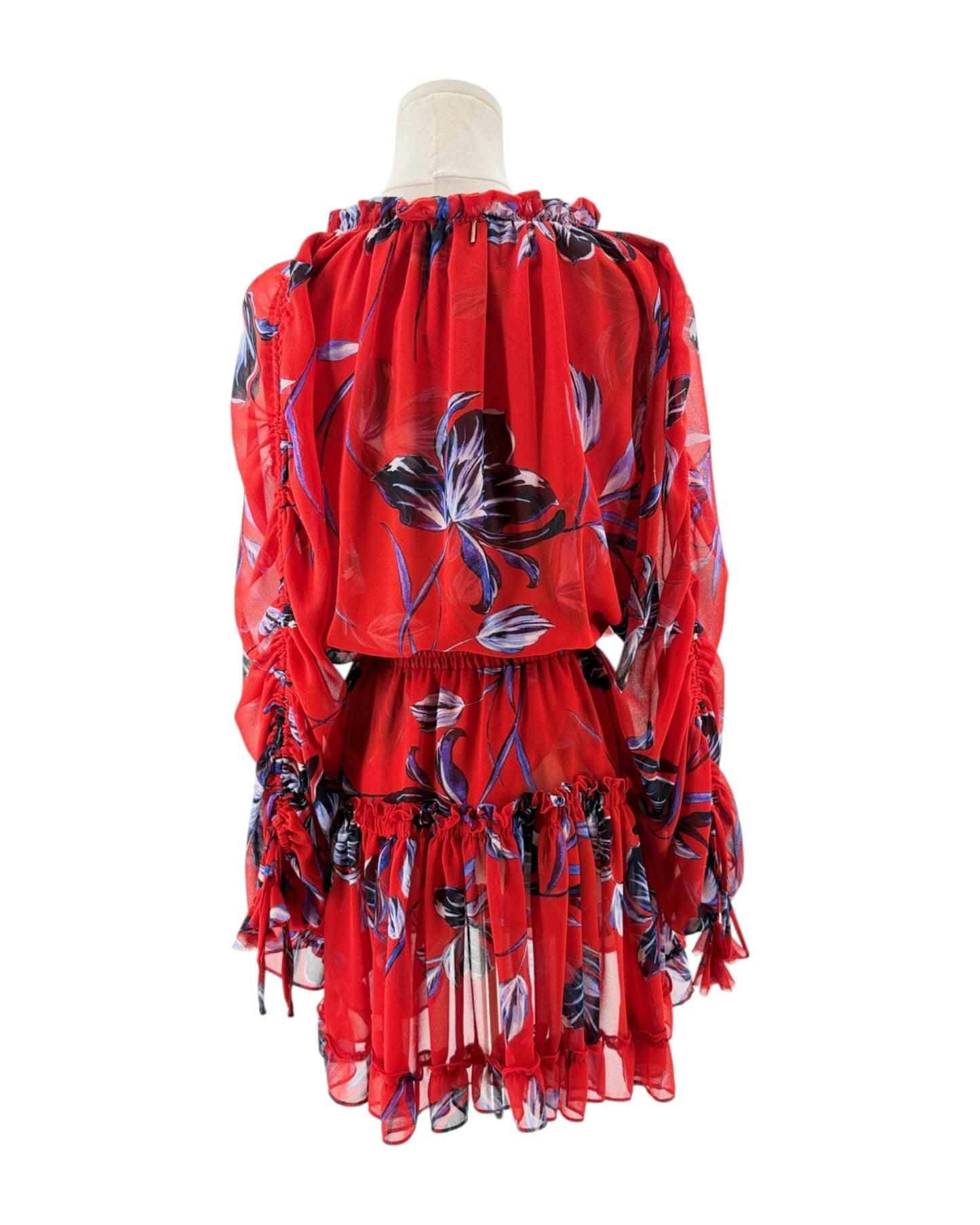Red floral dress on a mannequin against a white background