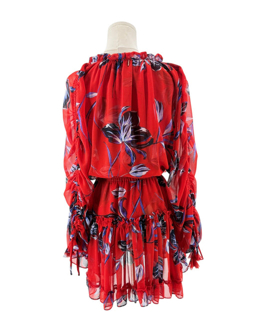 Red floral dress on a mannequin against a white background