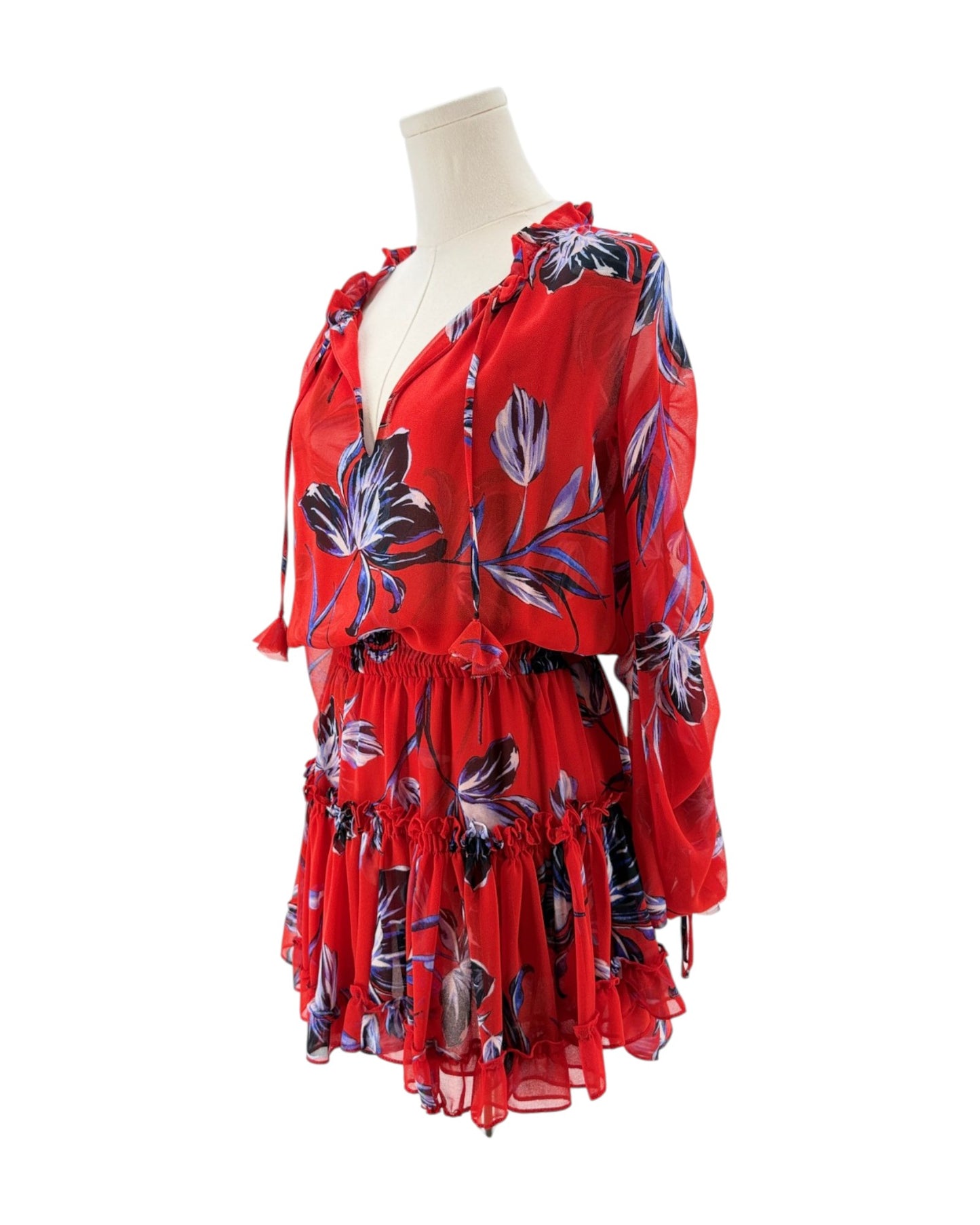 Red floral dress on a mannequin against a white background