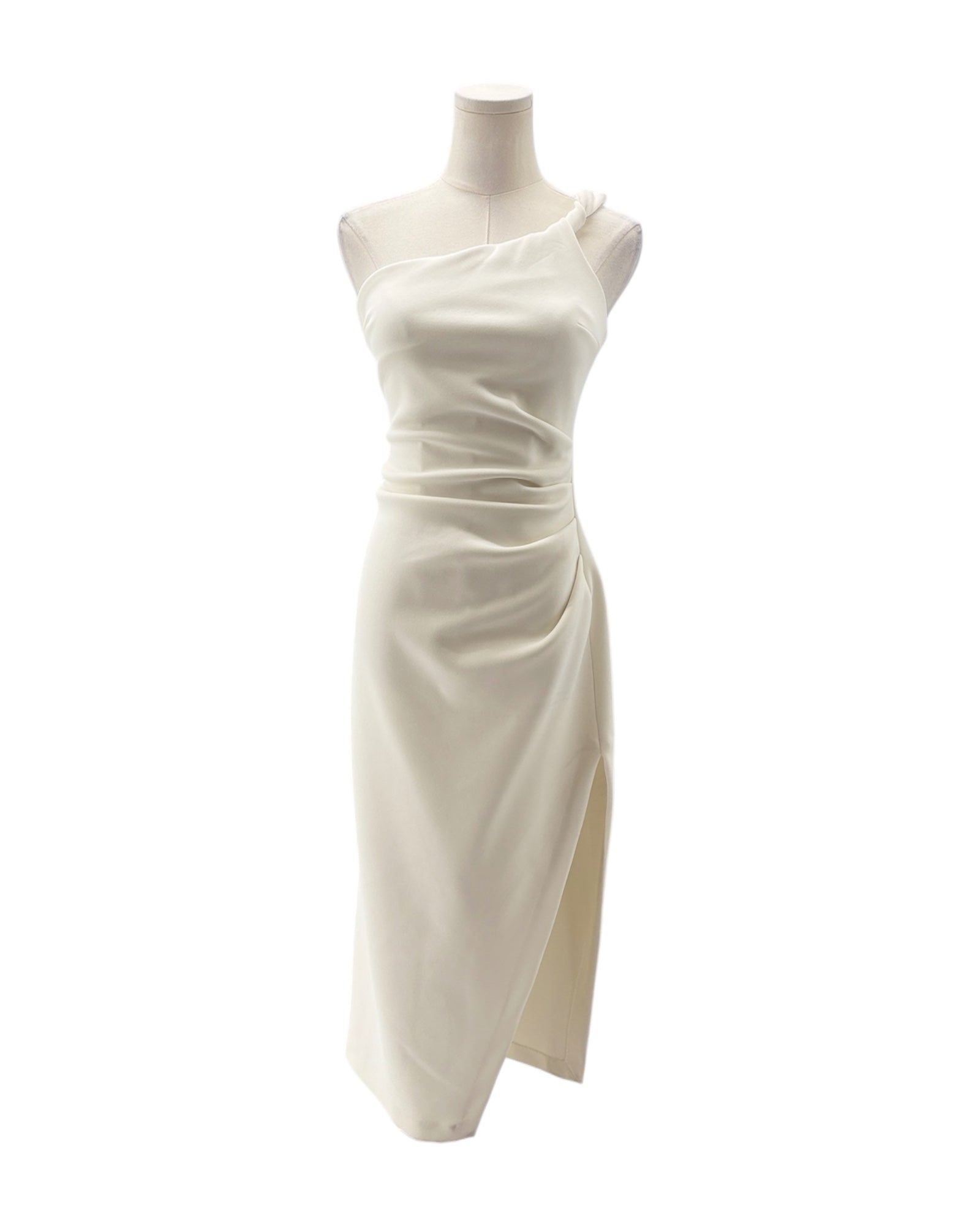 White one-shoulder dress on a mannequin against a white background