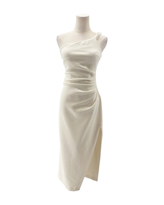White one-shoulder dress on a mannequin against a white background