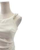 White dress on a mannequin against a white background