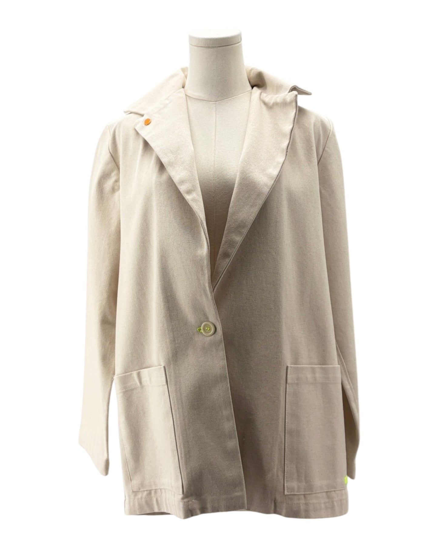 Beige jacket on a mannequin against a white background