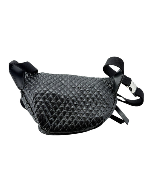 Black quilted leather bag with straps on a white background