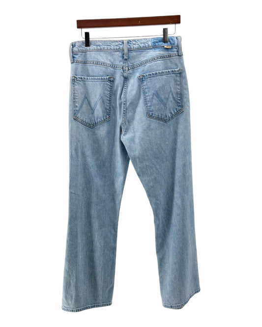 Light blue jeans on a hanger against a white background