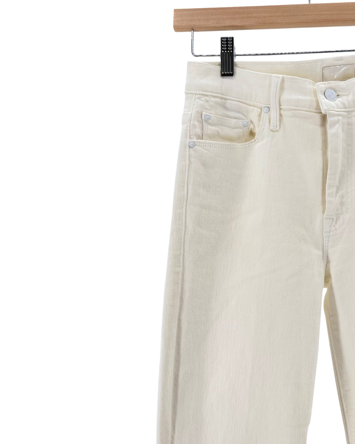 white denim jeans with a slight flare on a hanger on a white background