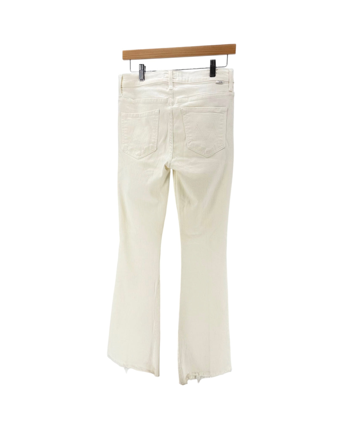 white denim jeans with a slight flare on a hanger on a white background