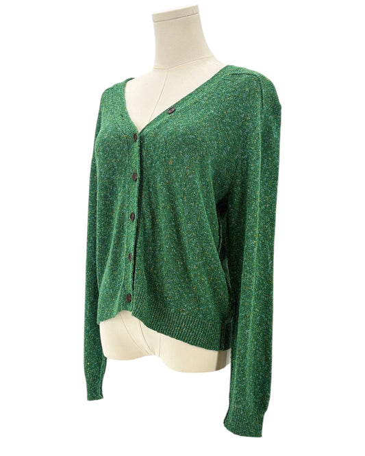 Green cardigan sweater on a mannequin against a white background