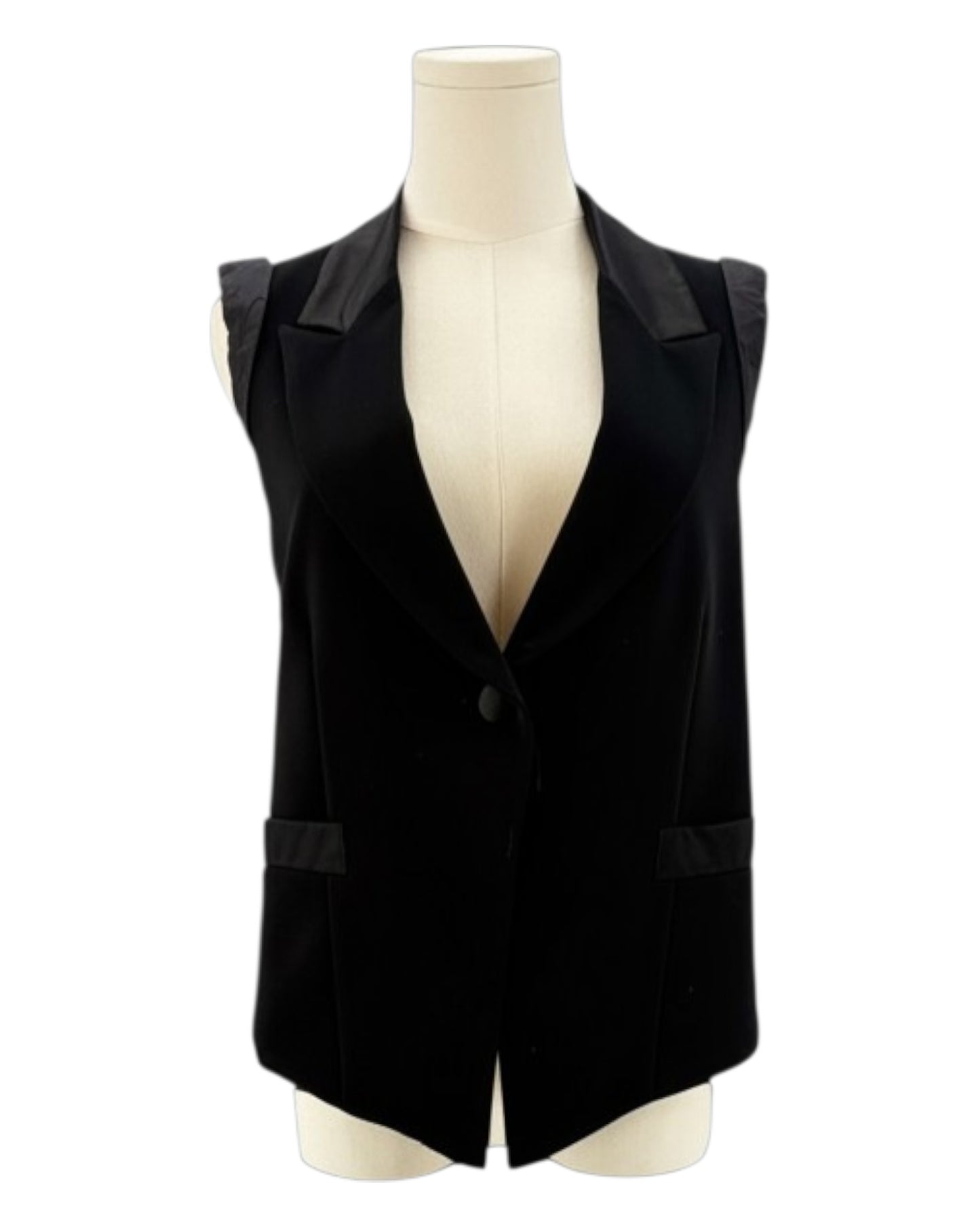 Nanette Lepore black sleeveless blazer with a tie waist on a mannequin against a white background