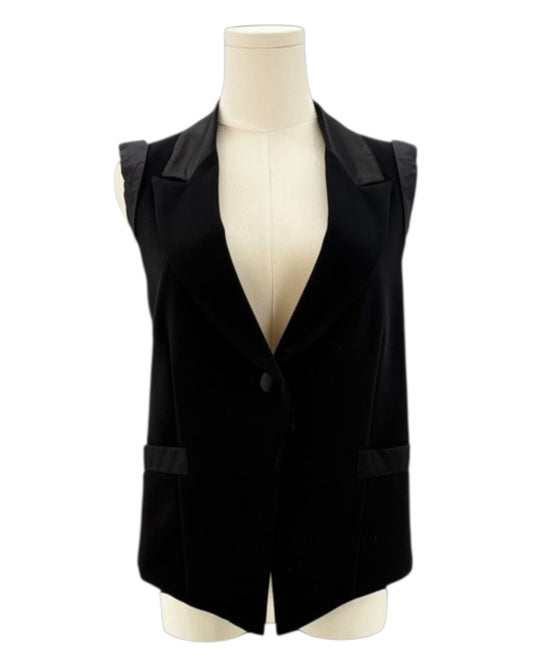 Nanette Lepore black sleeveless blazer with a tie waist on a mannequin against a white background