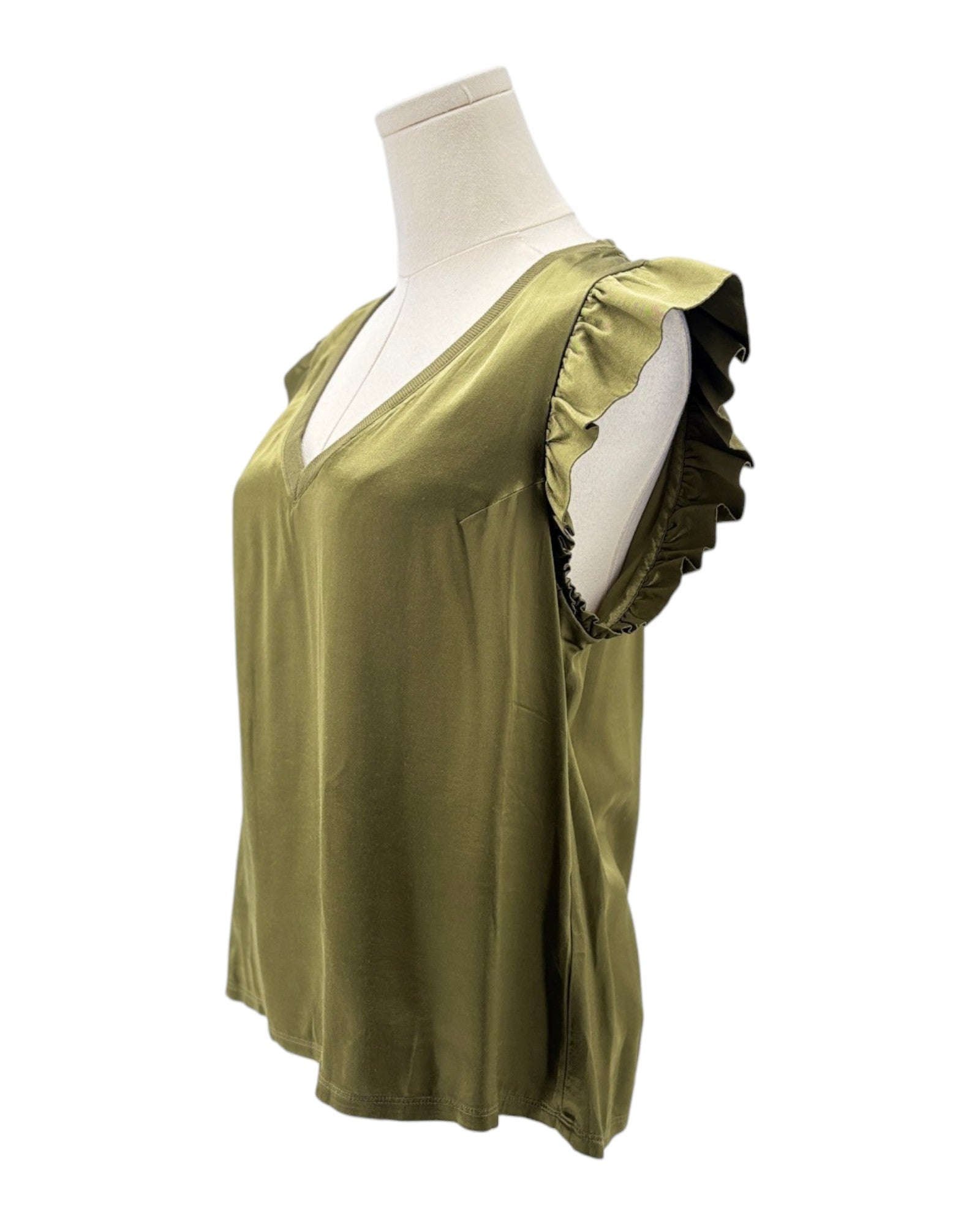 Green blouse with ruffled sleeves on a mannequin against a white background