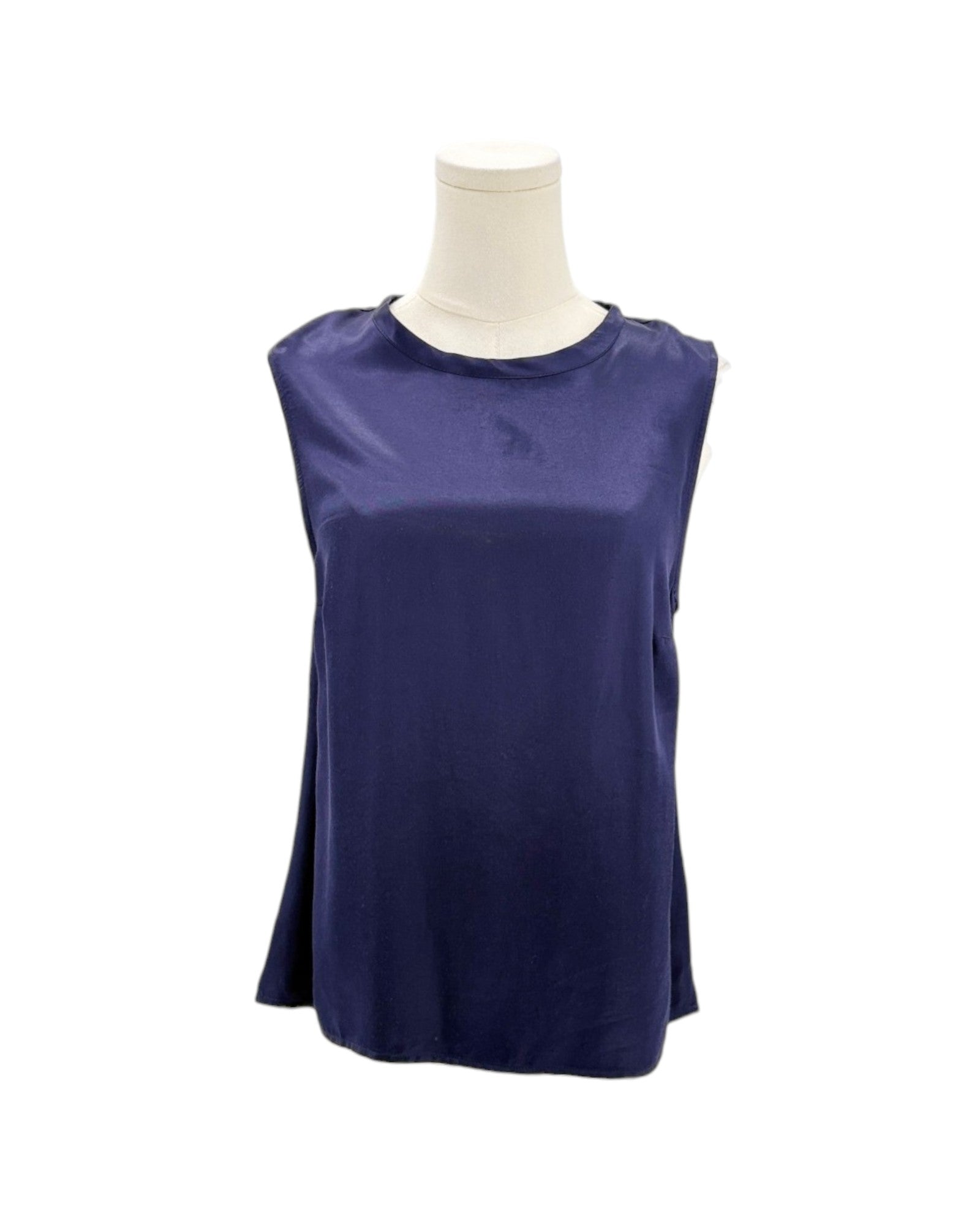 Navy blue sleeveless top on a mannequin against a white background