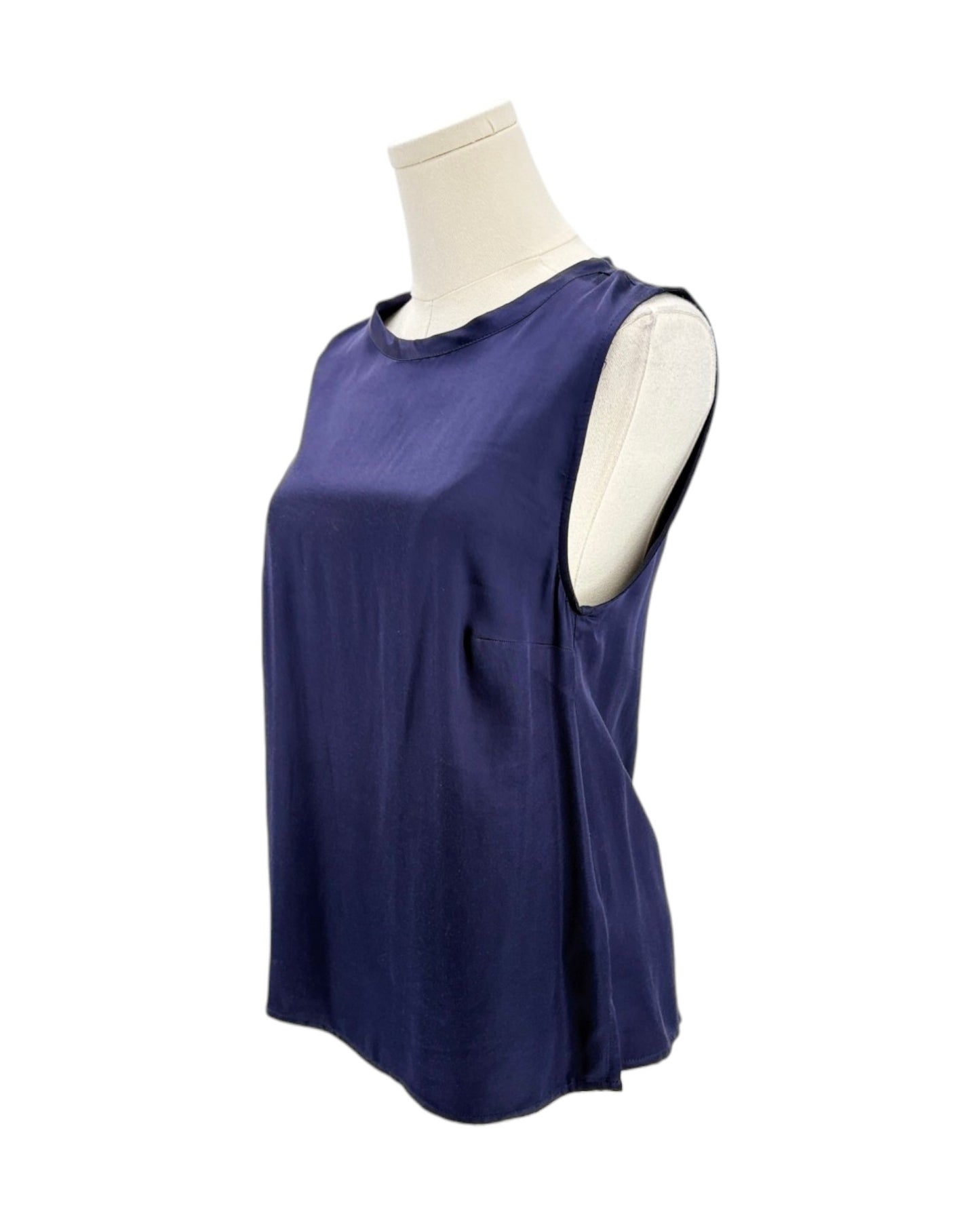 Navy blue sleeveless top on a mannequin against a white background