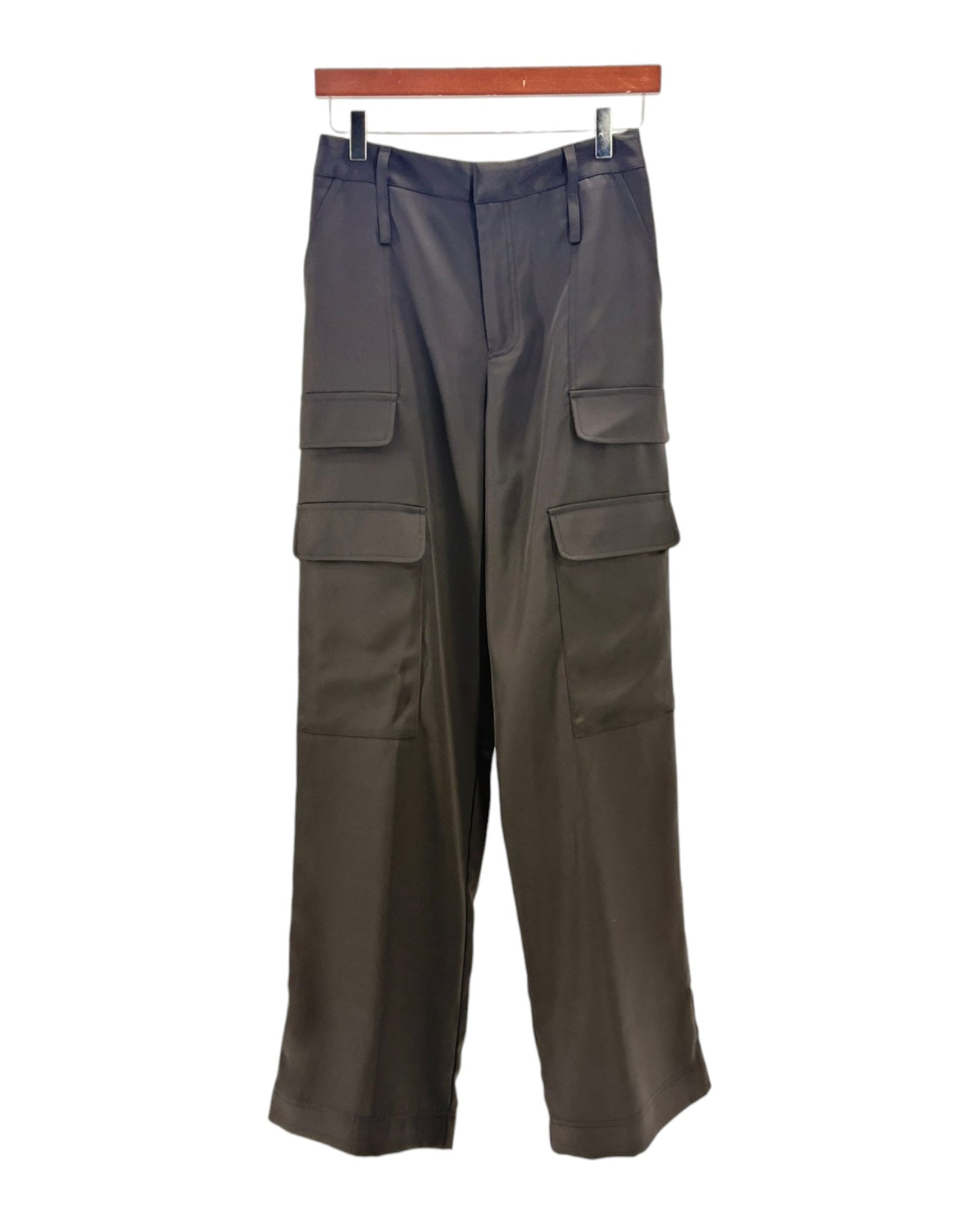 Black cargo pants on a hanger against a white background