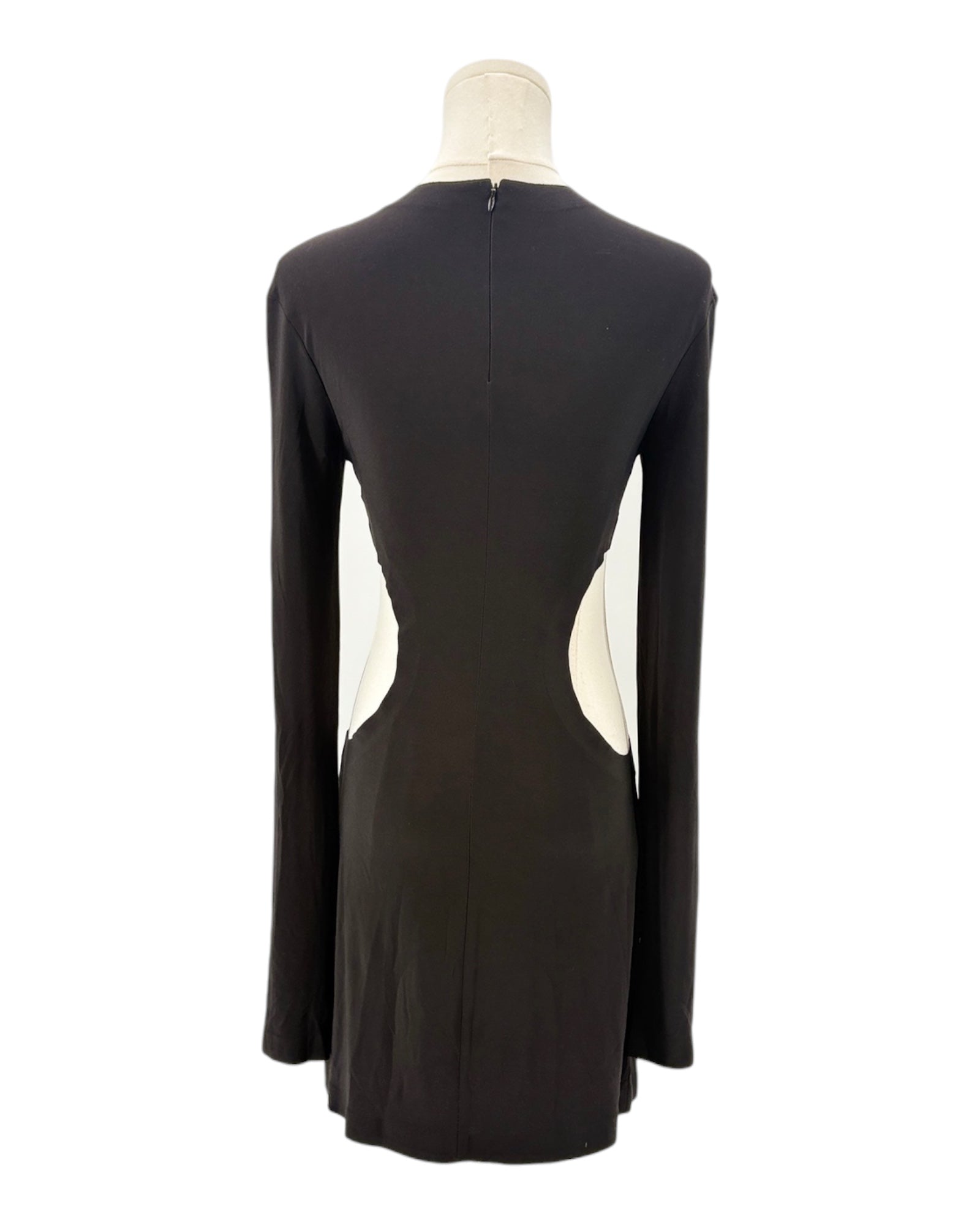Black dress with cut-out design on a mannequin against a white background