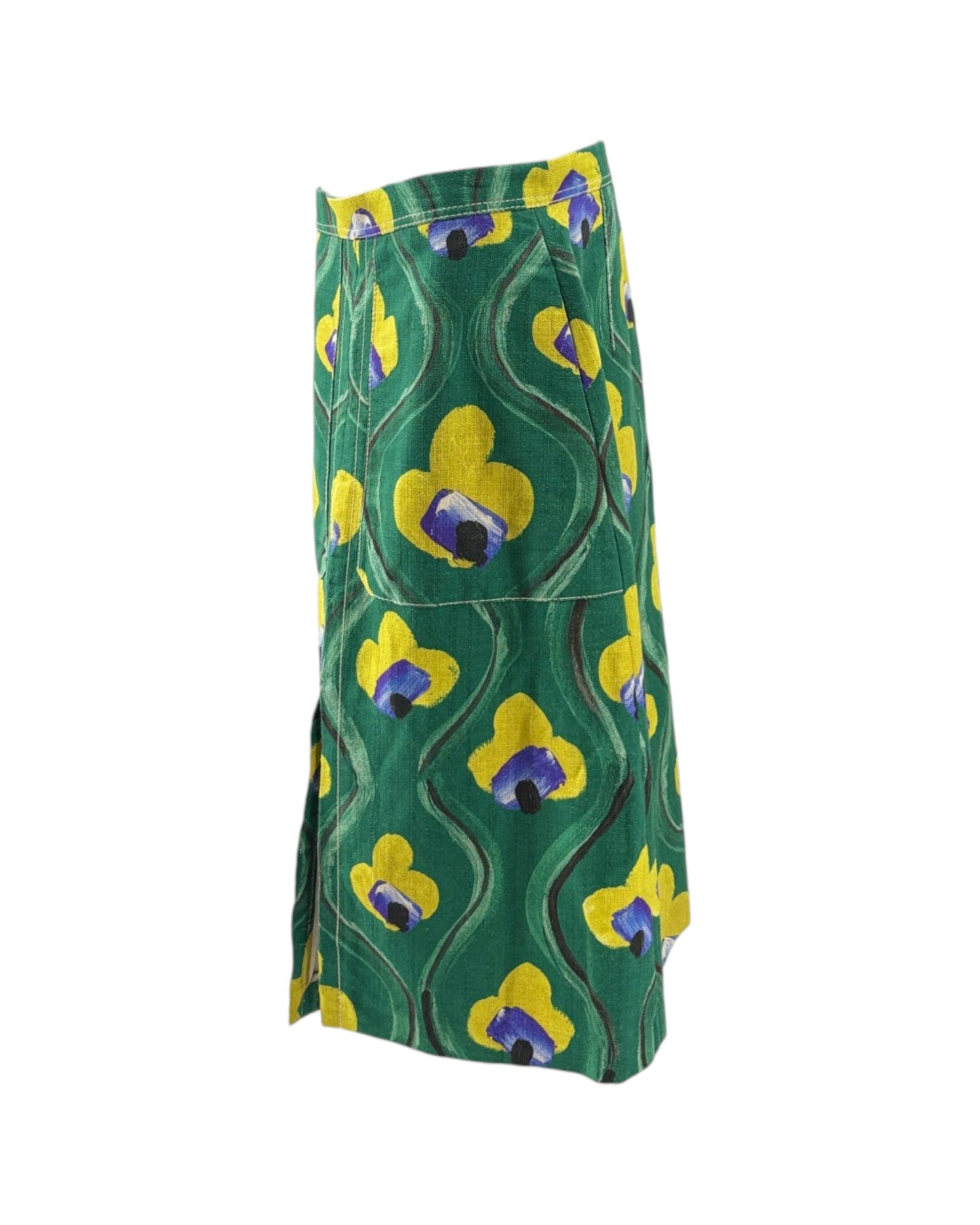 Green skirt with yellow and purple floral pattern on a white background