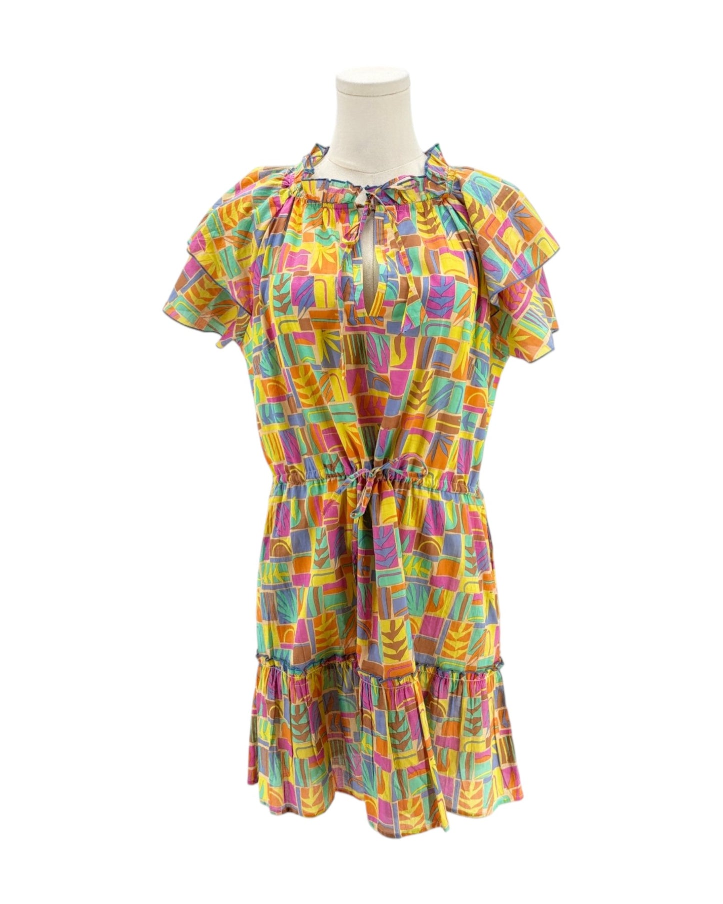 Multicolored mini dress on a mannequin on a white background