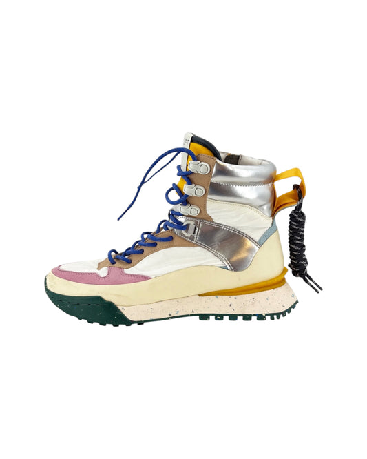 Multicolored high-top sneaker with metallic accents on a white background