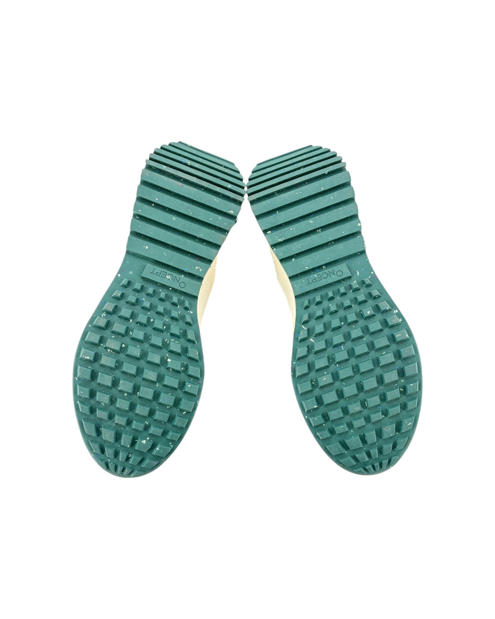 Green textured shoe sole on a white background