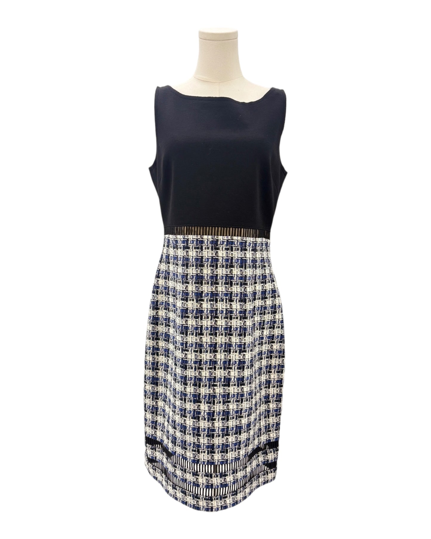 Mannequin wearing a navy sleeveless dress on a white background