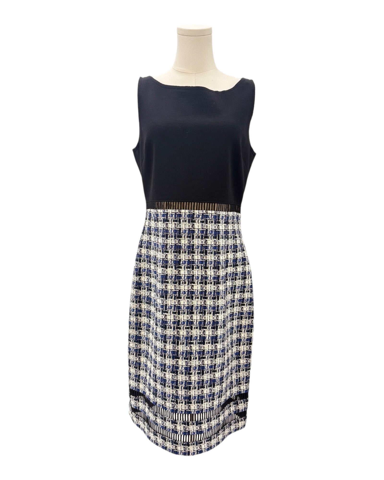 Mannequin wearing a navy sleeveless dress on a white background
