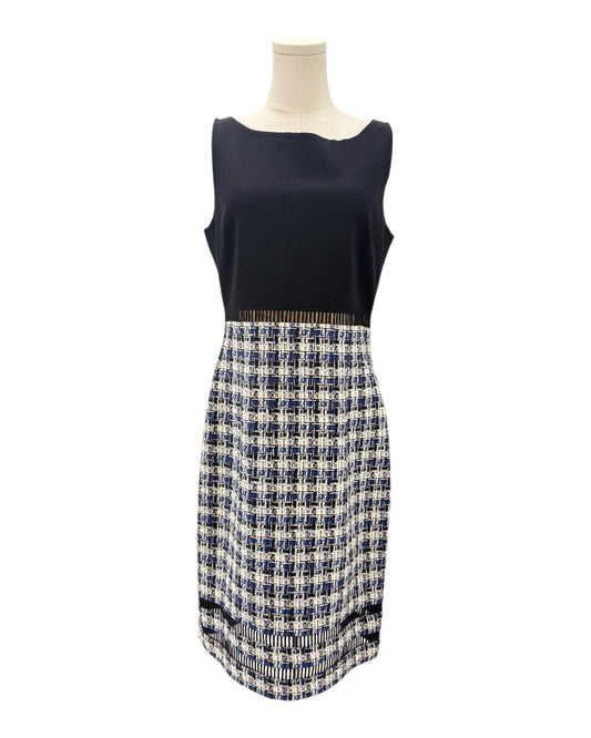 Mannequin wearing a navy sleeveless dress on a white background