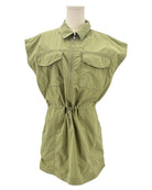 Green sleeveless mini dress on a mannequin against a white background
