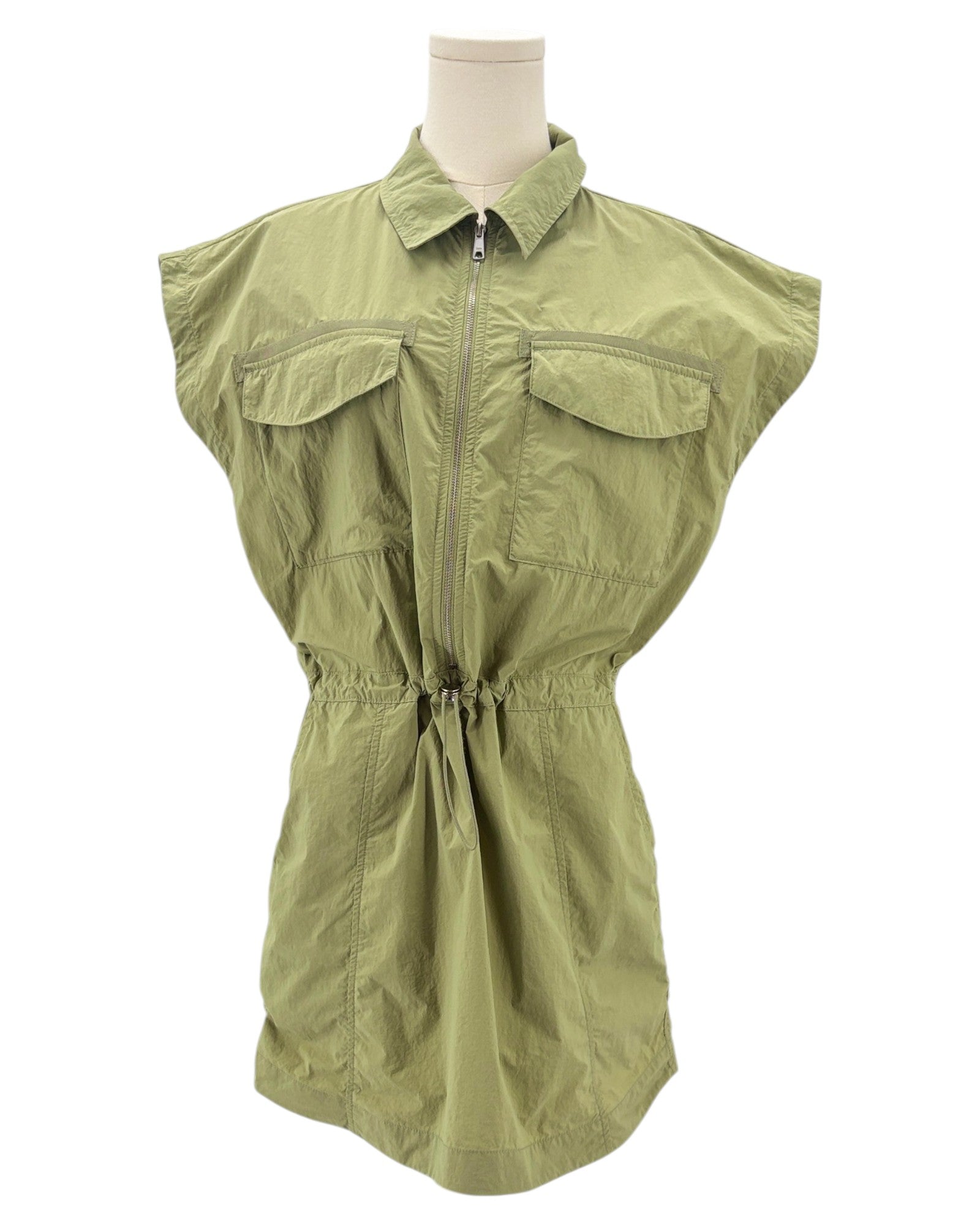 Green sleeveless mini dress on a mannequin against a white background