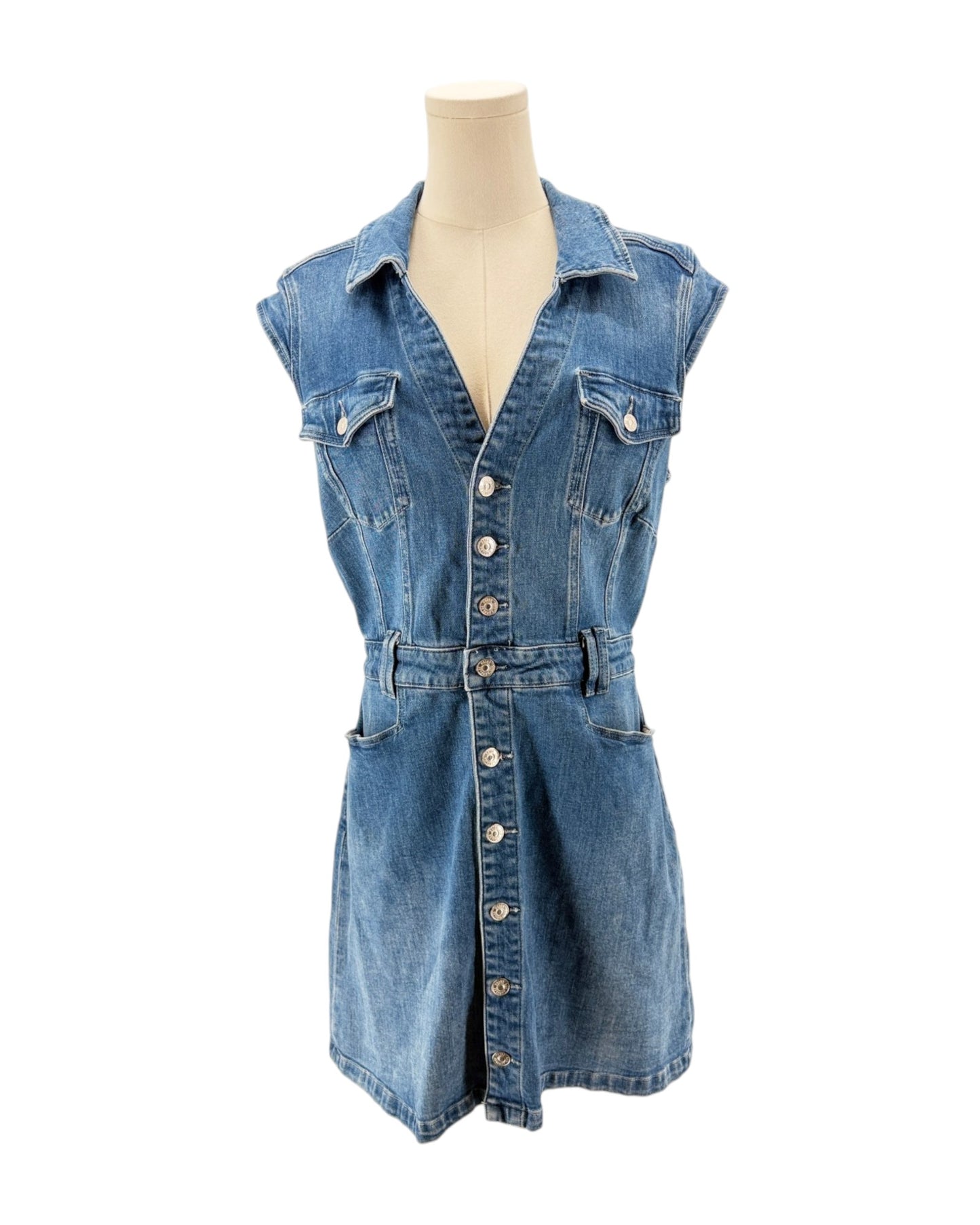 Blue denim dress on a mannequin against a white background
