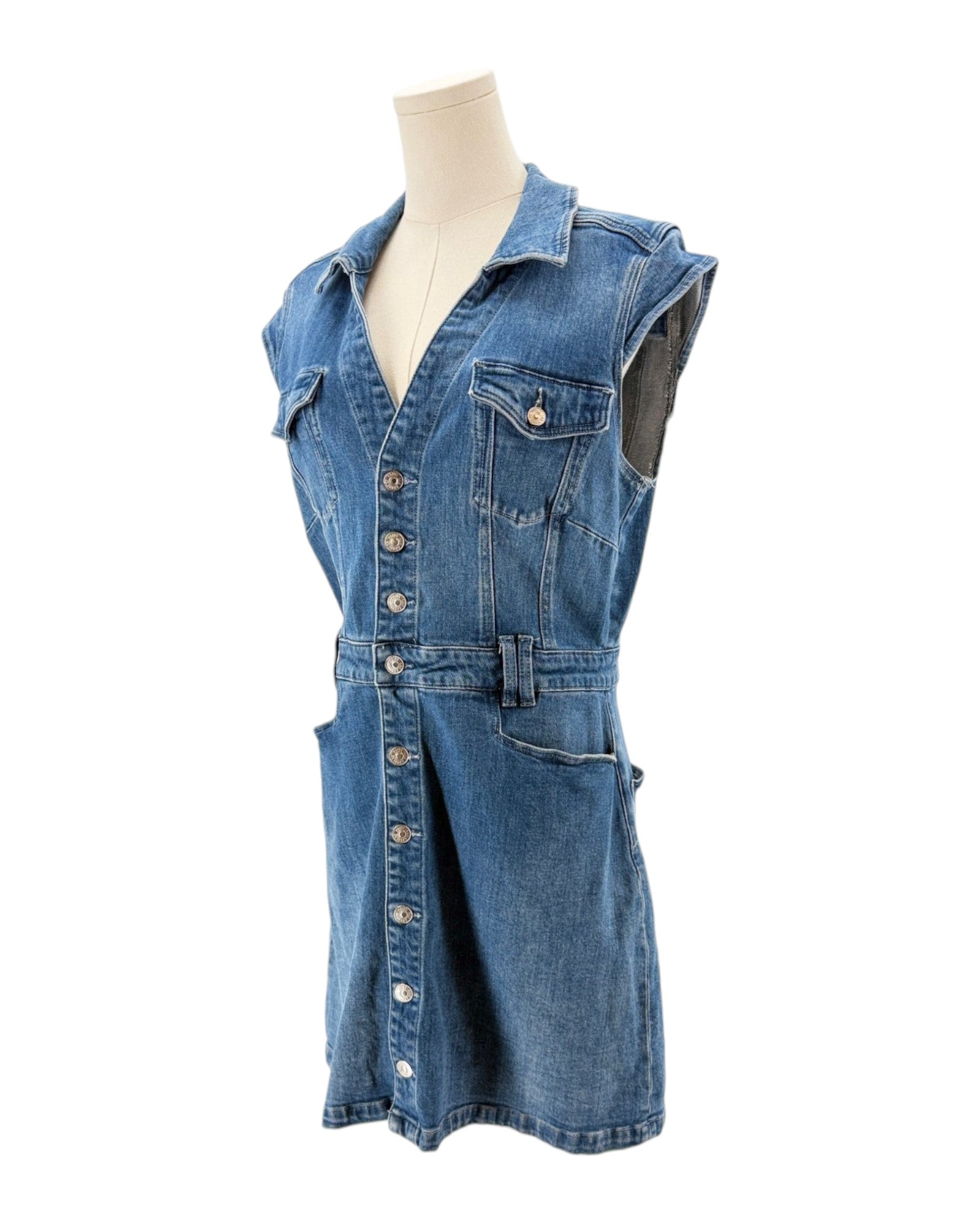 Denim dress on a mannequin against a white background
