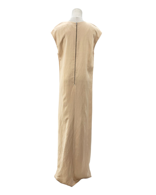 Beige dress on a mannequin against a white background
