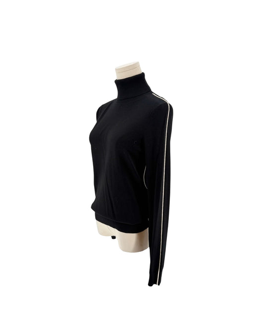 Long sleeve black with a white embroidered strip along the shoulder and sleeve turtleneck sweater on a white background