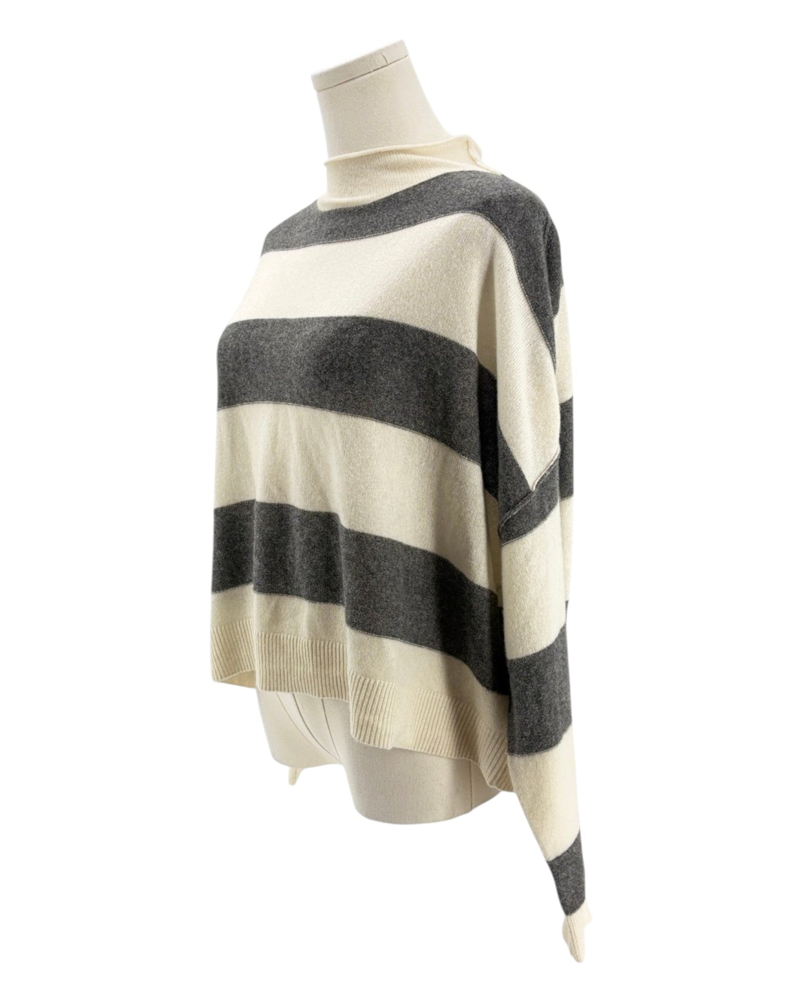 Striped sweater on a mannequin against a white background