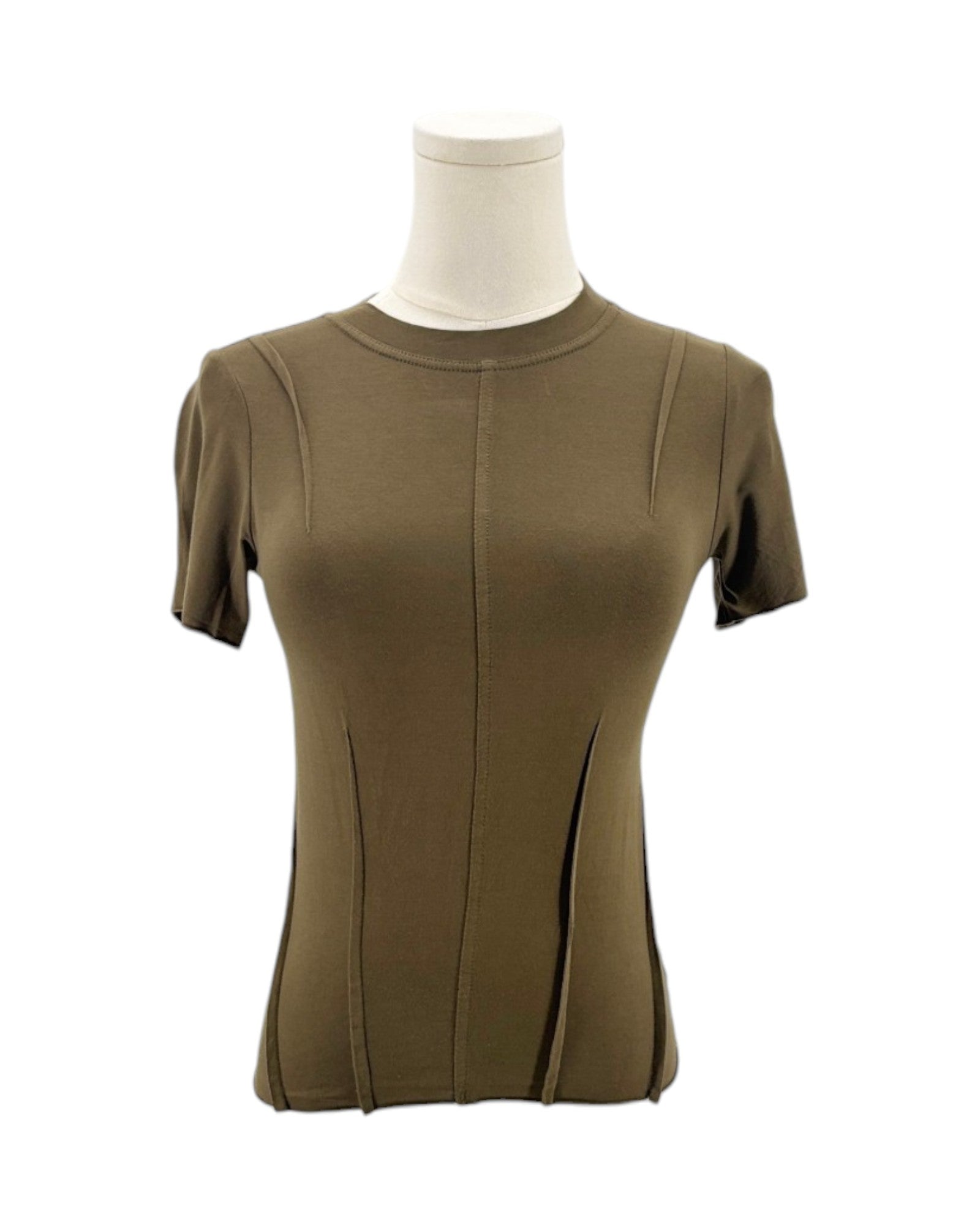 Green short-sleeve top on a mannequin against a white background