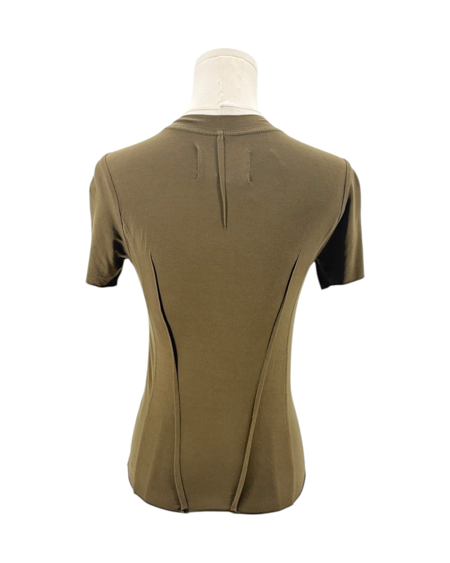 Green top on a mannequin with a white background