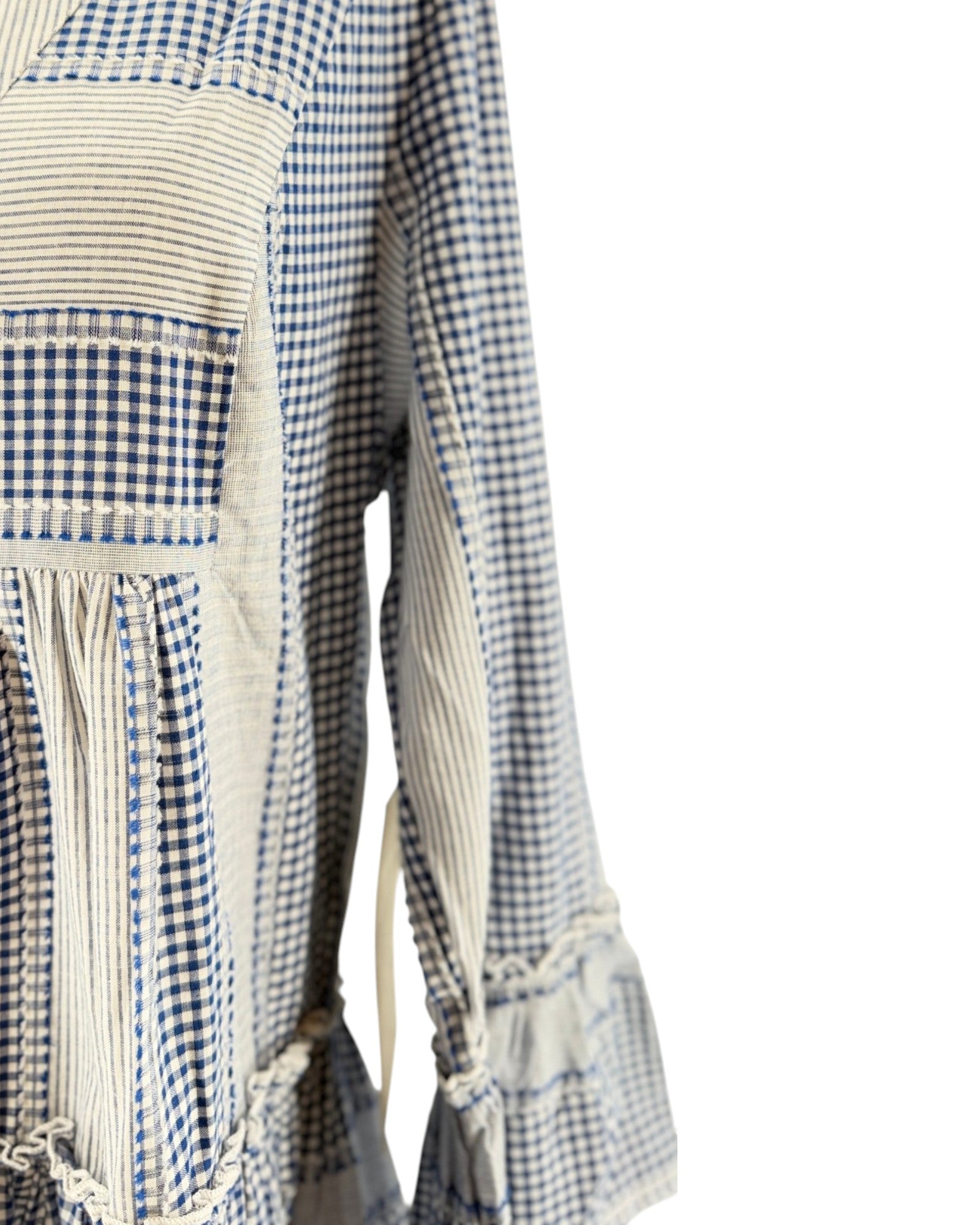 Blue and white checkered apron with a white background