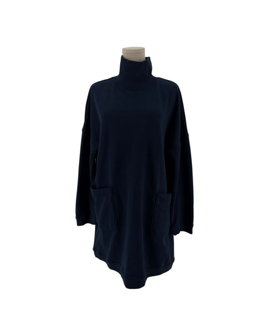Navy oversized silhouette, high mock/turtleneck, long sleeves, two distinctive large patch pockets on the front on a mannequin on a white background