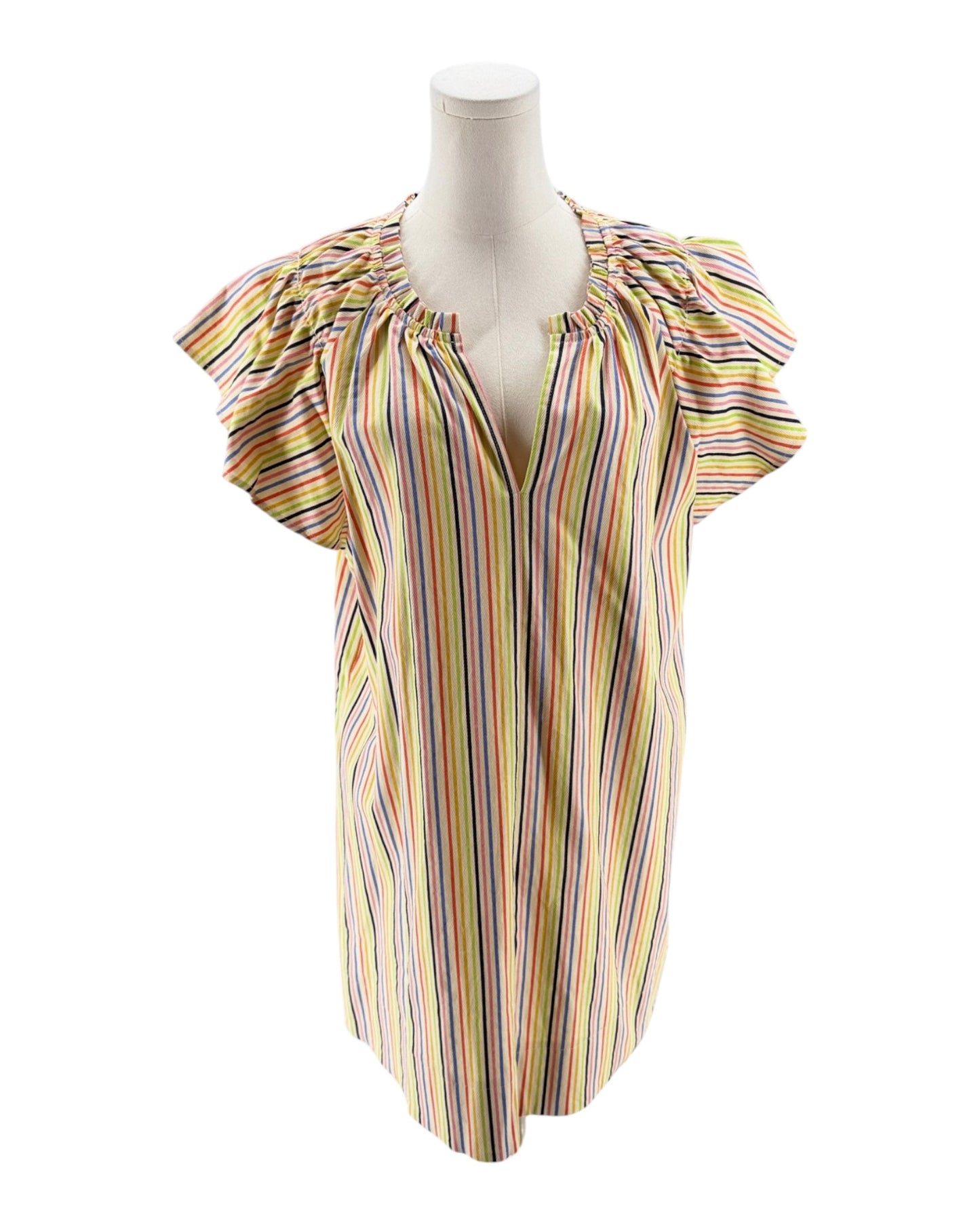 Colorful striped blouse on a mannequin against a white background