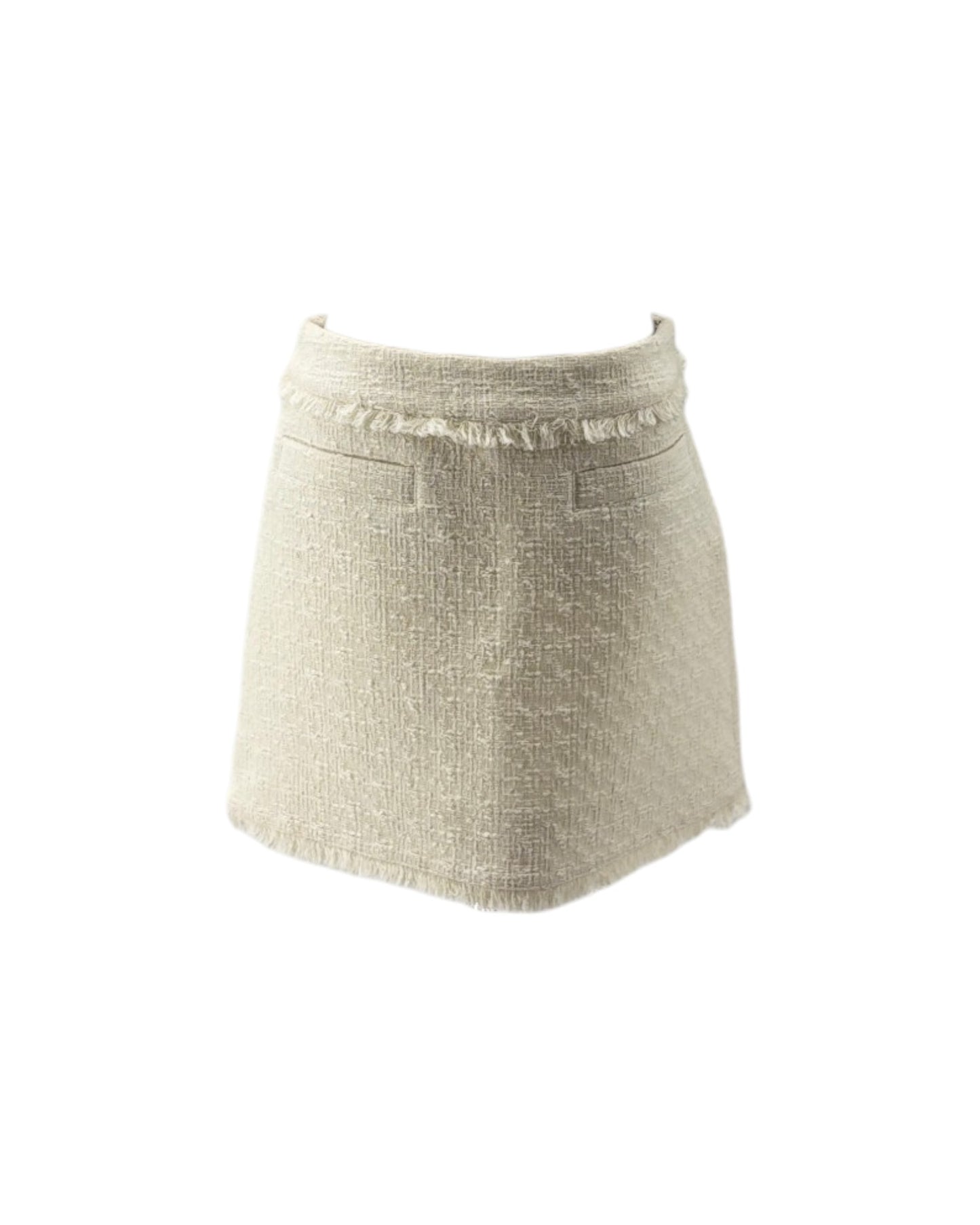 A light beige textured tweed mini skirt with a frayed waistband and front pockets, shown against a plain white background.