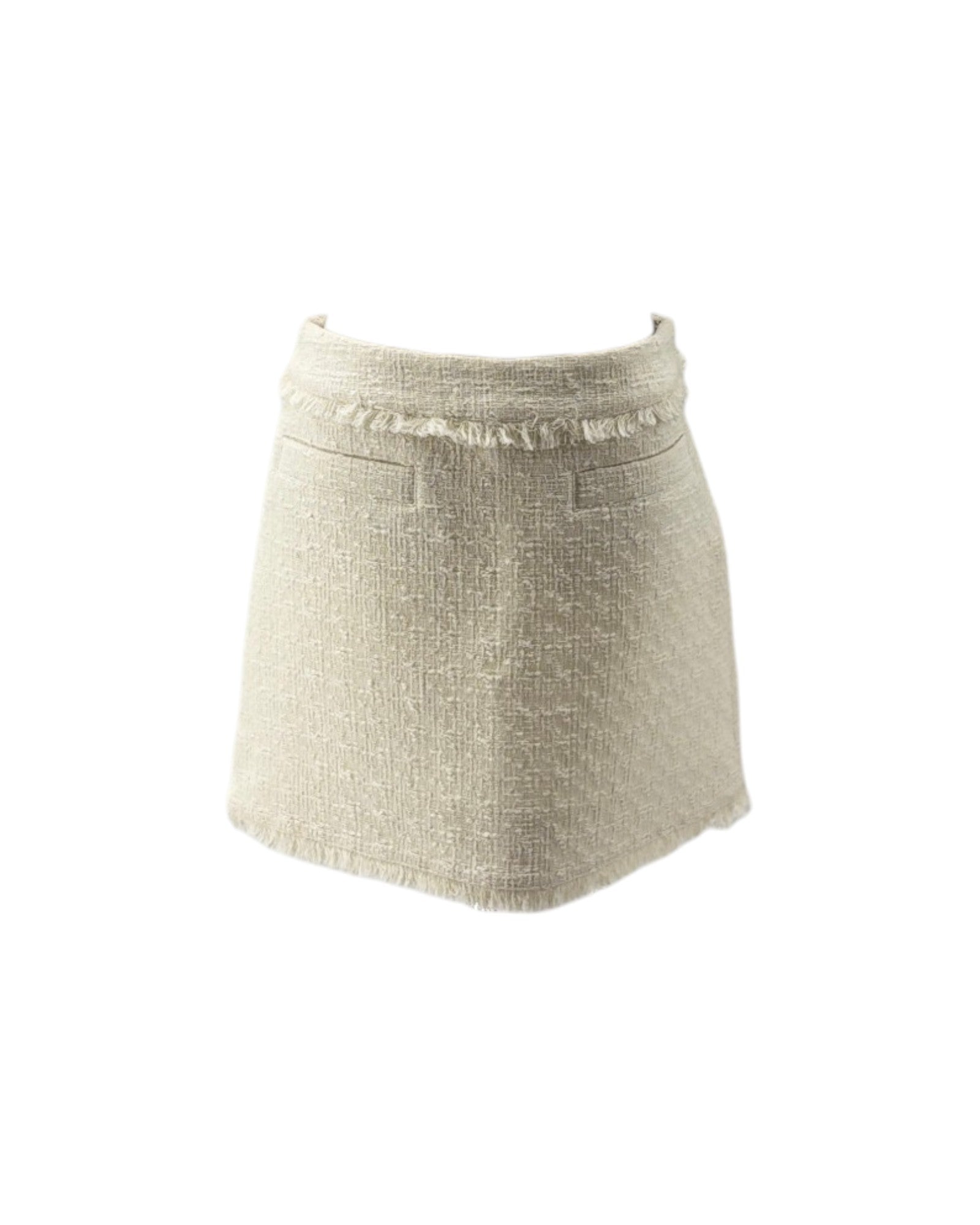 A light beige textured tweed mini skirt with a frayed waistband and front pockets, shown against a plain white background.