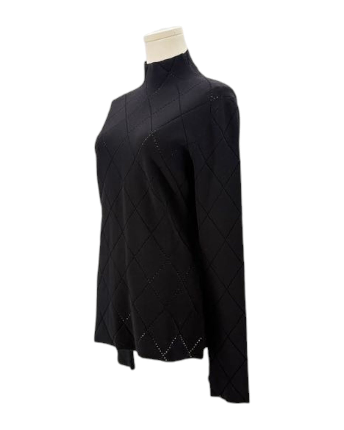 Black diamond-patterned sweater on a mannequin against a white background
