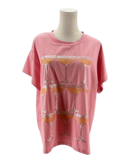 Pink t-shirt with glass design on a mannequin against a white background