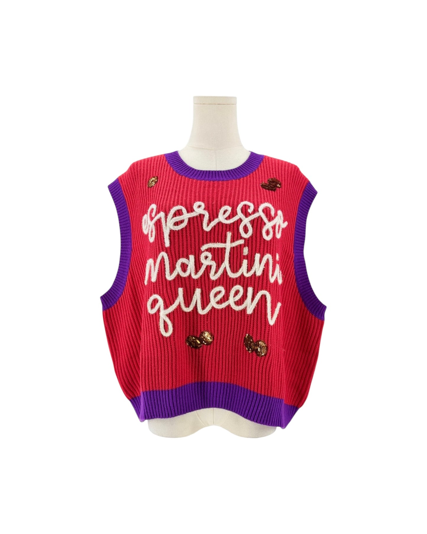 A sleeveless ribbed knit sweater vest in red and purple, featuring the phrase 'express martini queen' in white script across the front, displayed on a mannequin torso against a white background.