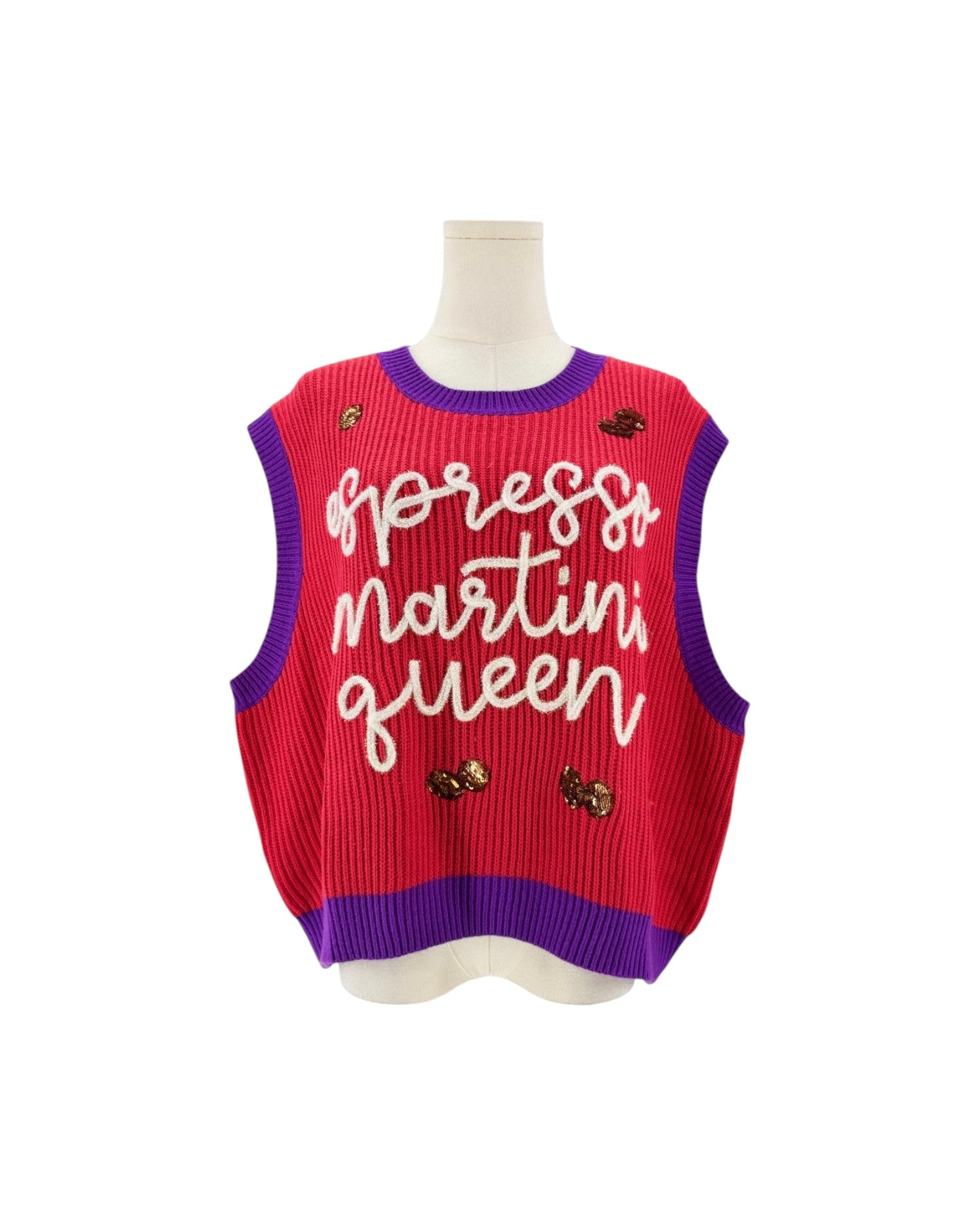 A sleeveless ribbed knit sweater vest in red and purple, featuring the phrase 'express martini queen' in white script across the front, displayed on a mannequin torso against a white background.