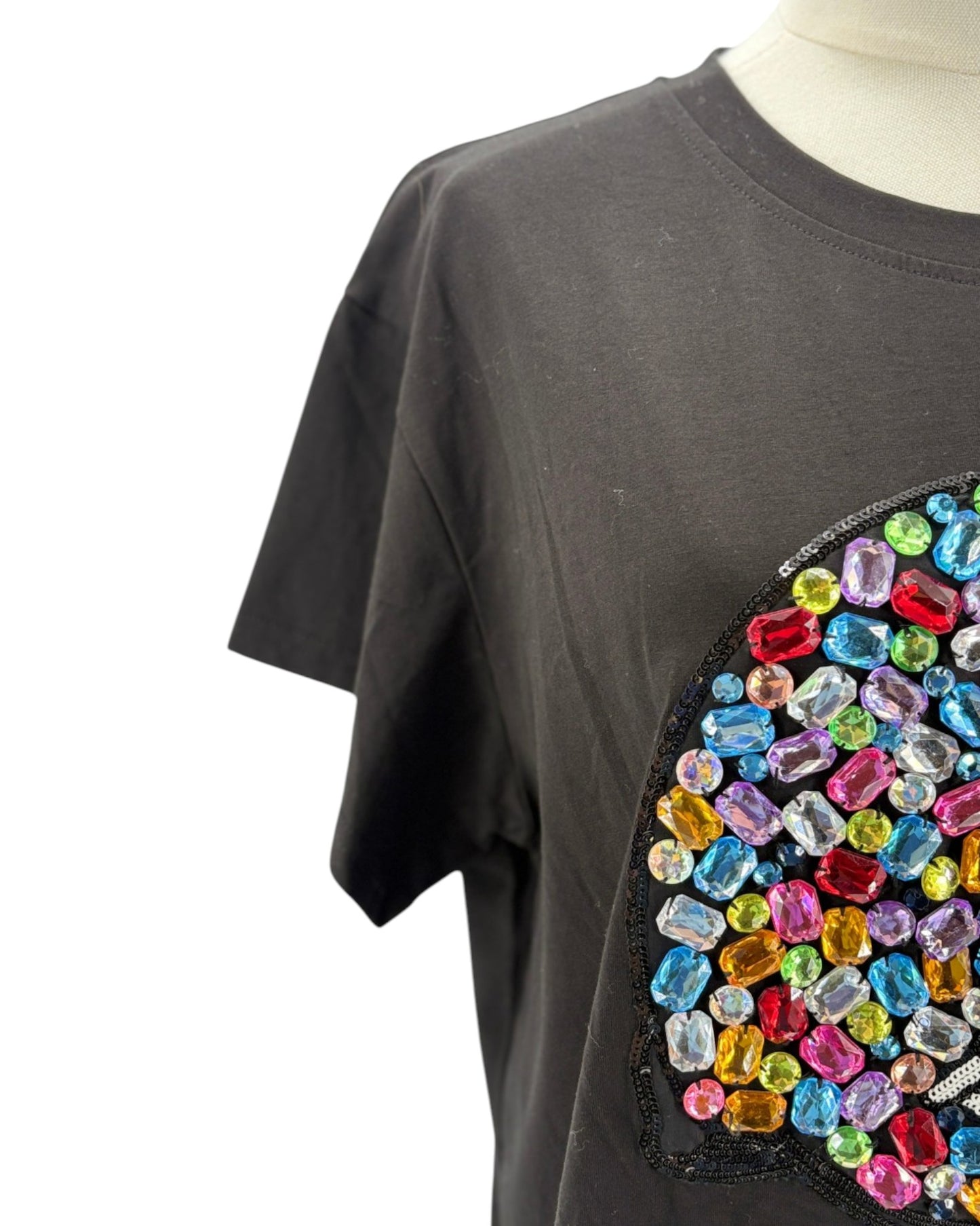 Black short sleeve top with bejeweled football helmet