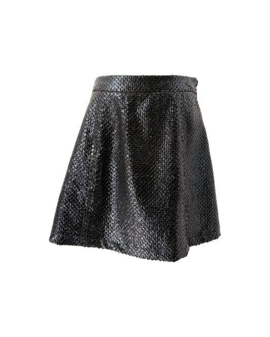 A black textured mini skirt with a subtle snakeskin or reptile-scale pattern, shown against a plain white background.
