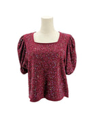 Solid Embellished Top on a mannequin on a white background