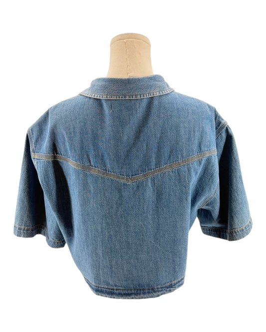 Denim short on a mannequin against a white background