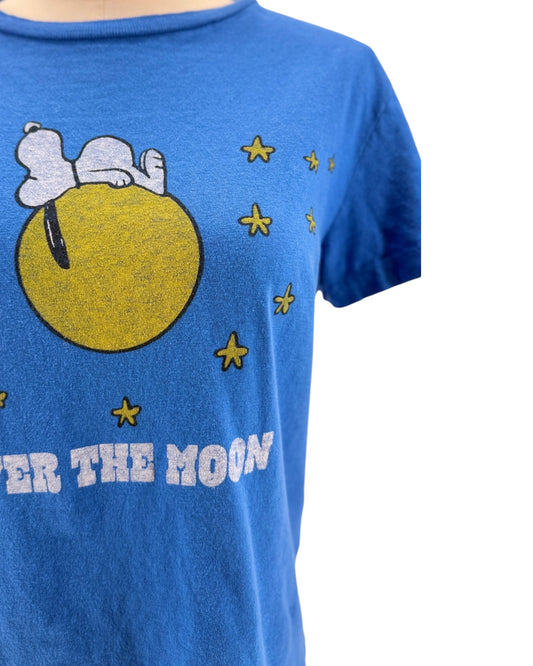 Blue t-shirt with cartoon character and text 'Up to the Moon' on a white background