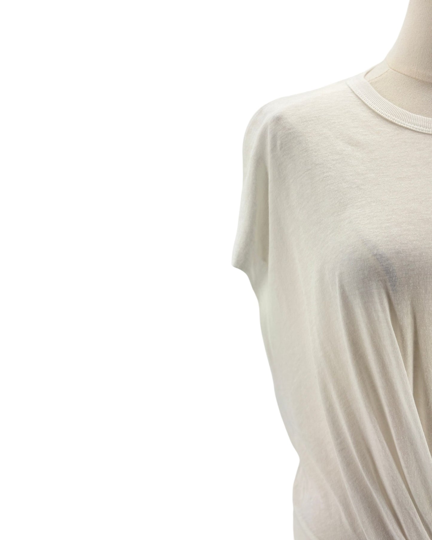 white sleeveless top on a mannequin against a white background